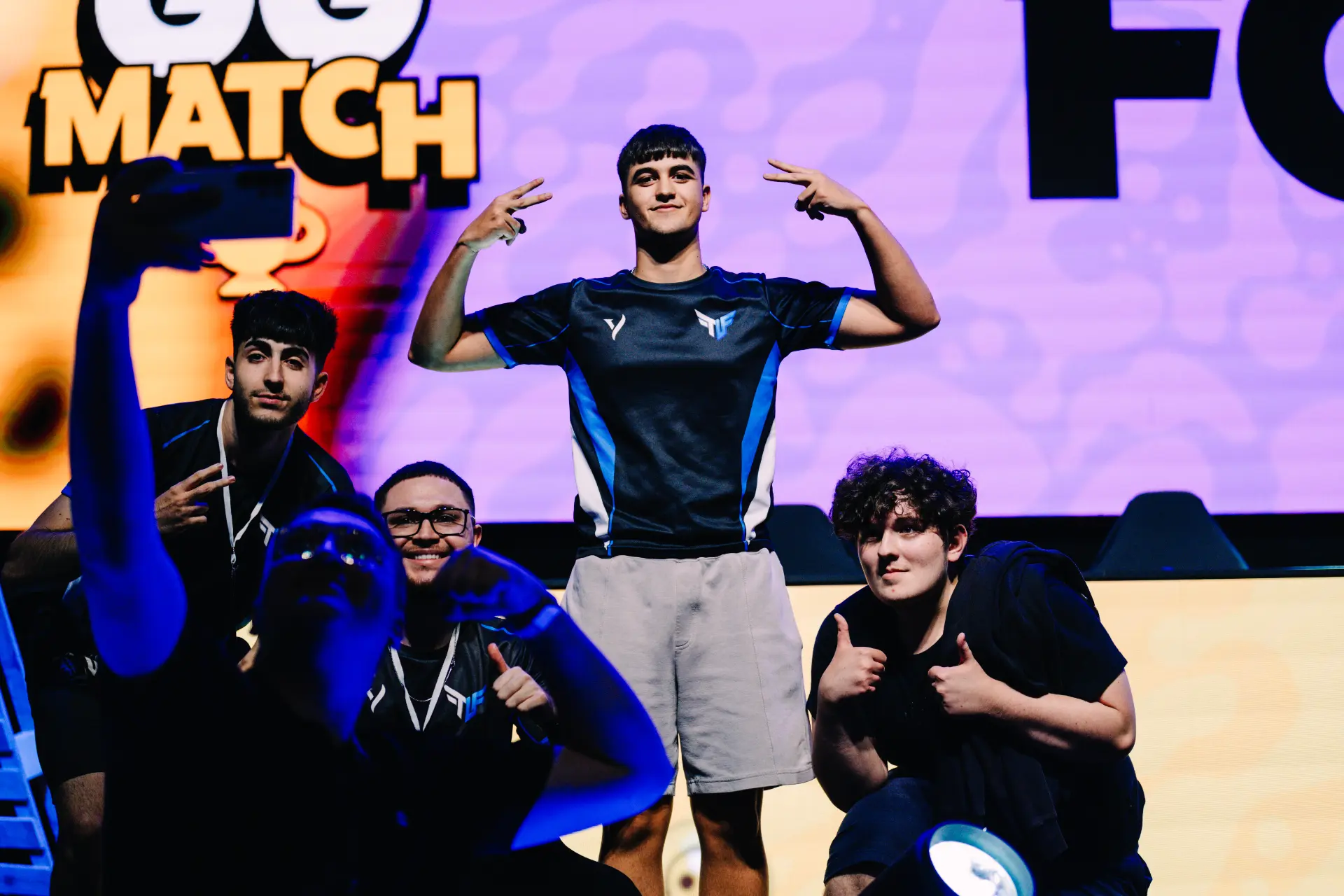 TLF celebrating on stage at the Challengers Finals